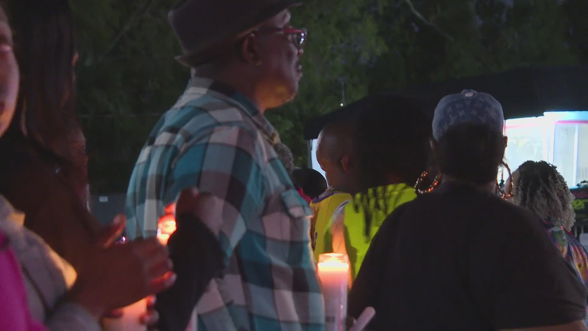 Loved ones of Robbie Roberts gathered at the intersection of Lenox and Normandy, where she was hit, to pray and remember the 53-year-old's life.