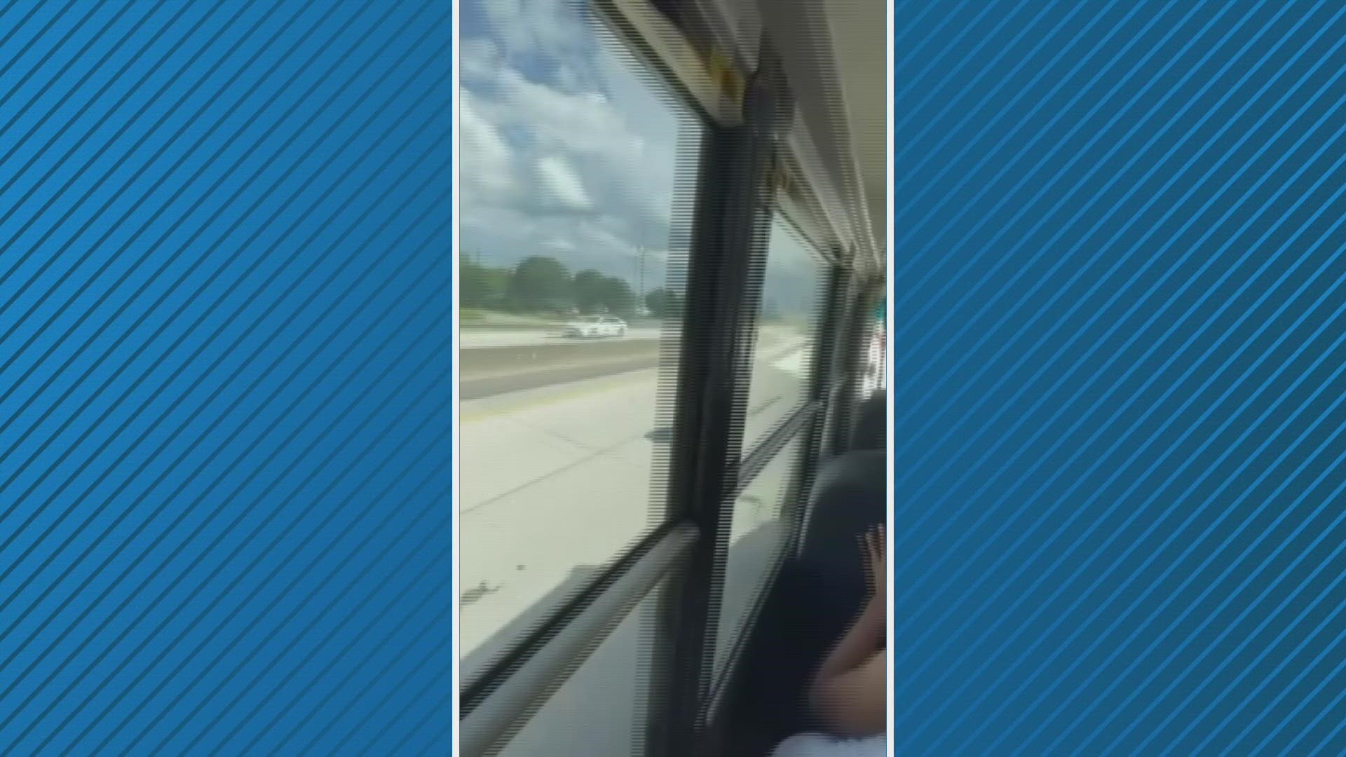 A school bus is seen rolling away from a Duval County school bus and bouncing down the road in this video filmed by a student.