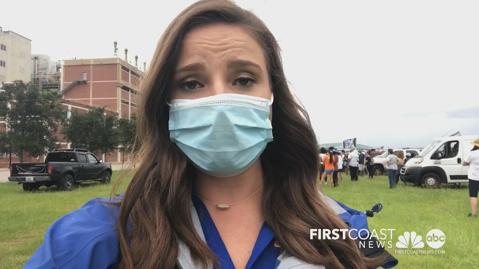 Activists gathered for a drive-in rally in front of the Jacksonville Sheriff's Office.