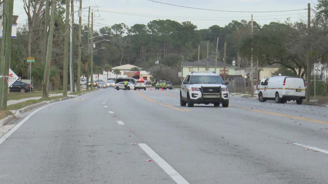 Man dead, woman injured in shooting outside of business in Emerson area