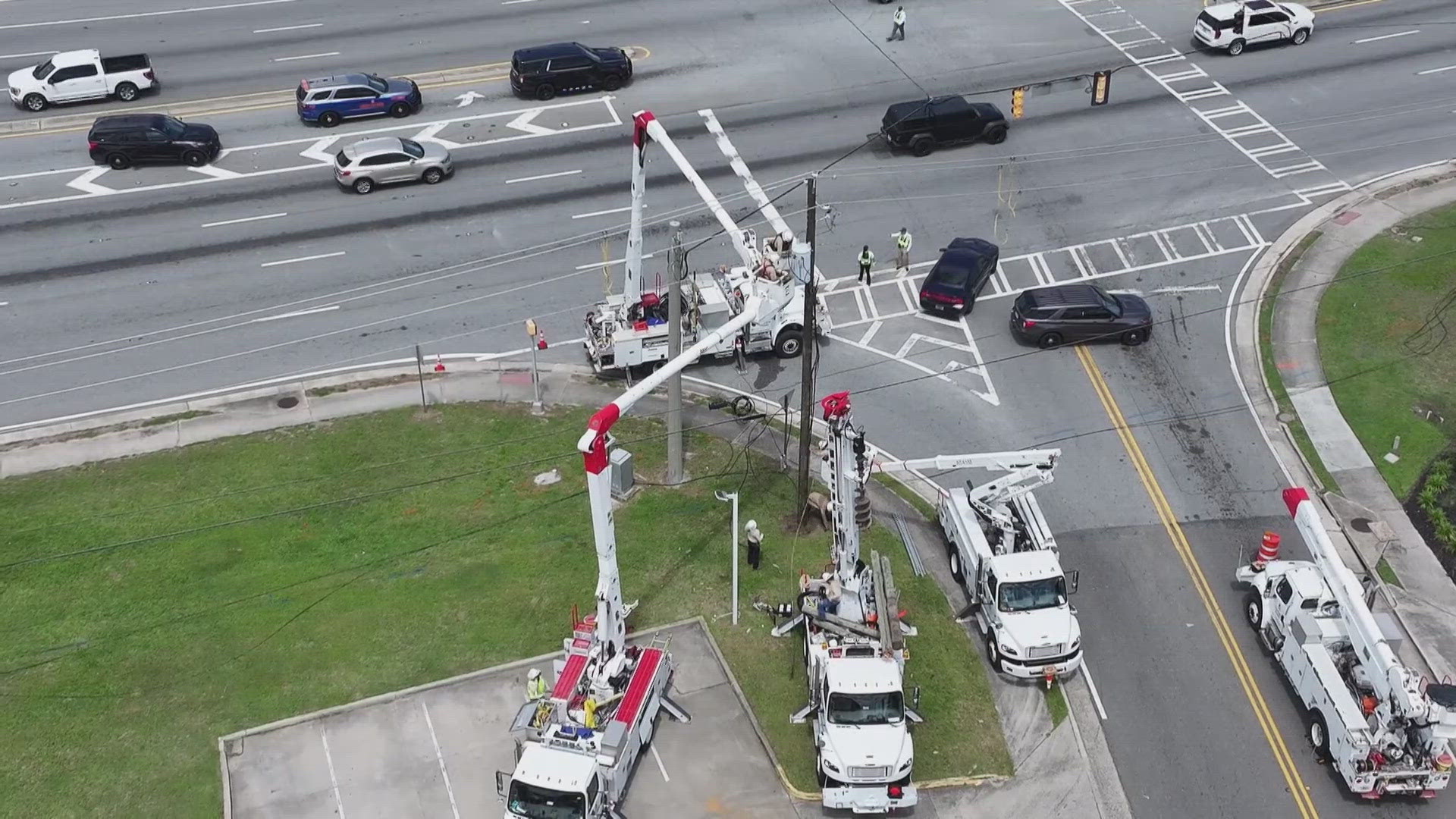 The Glynn County Sheriff's Office said a semi-truck crash caused the live powerlines to land on the highway.
