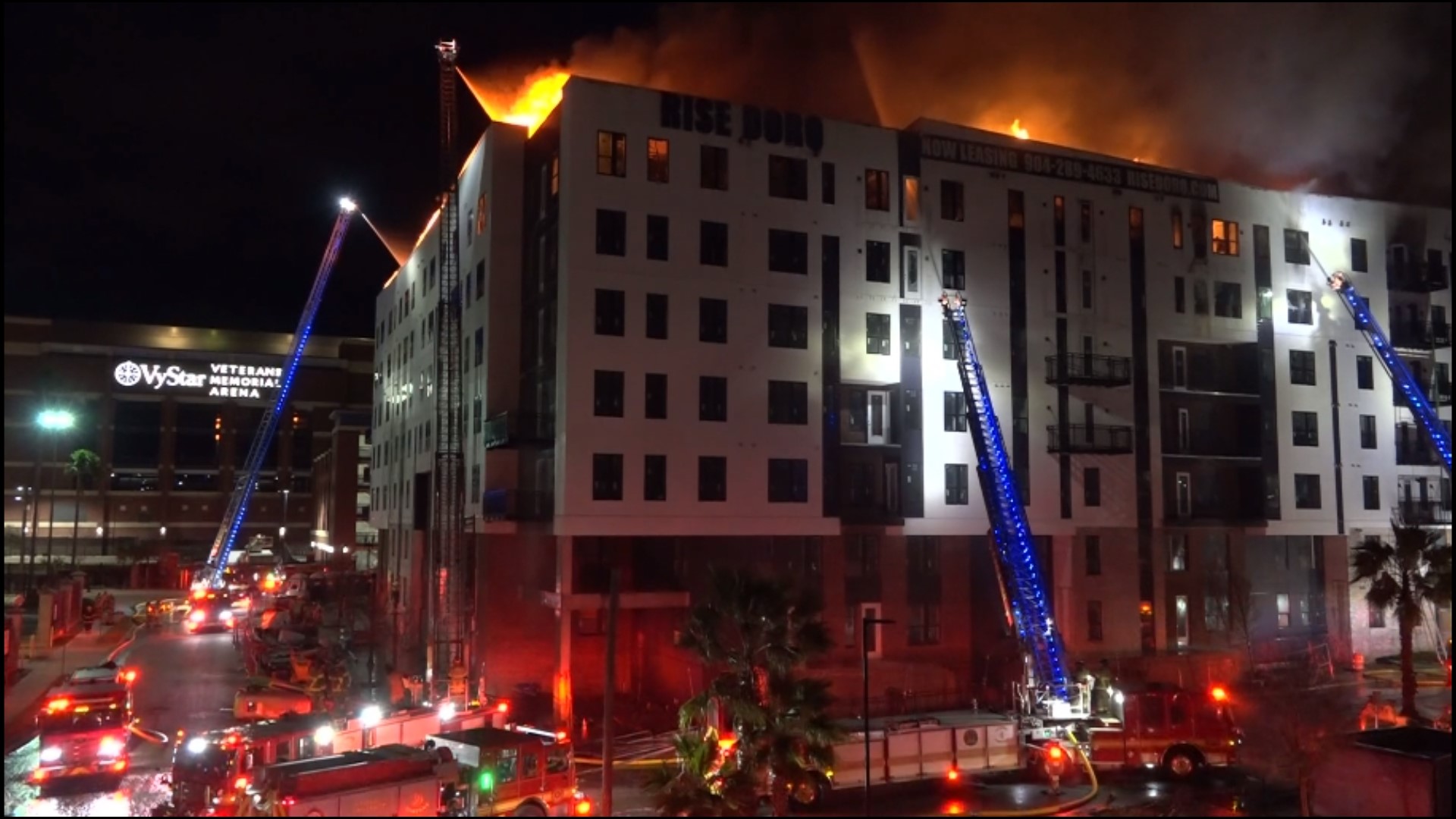 The Jacksonville Fire and Rescue Department says the fire is between the 6th and 7th floors of the apartment.