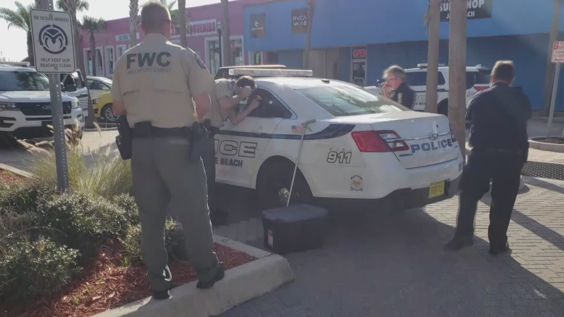 Police say a homeless man was found walking around with the nearly 8-foot long rattlesnake Monday morning. The FWC was able to capture it and will release it into the wild.
