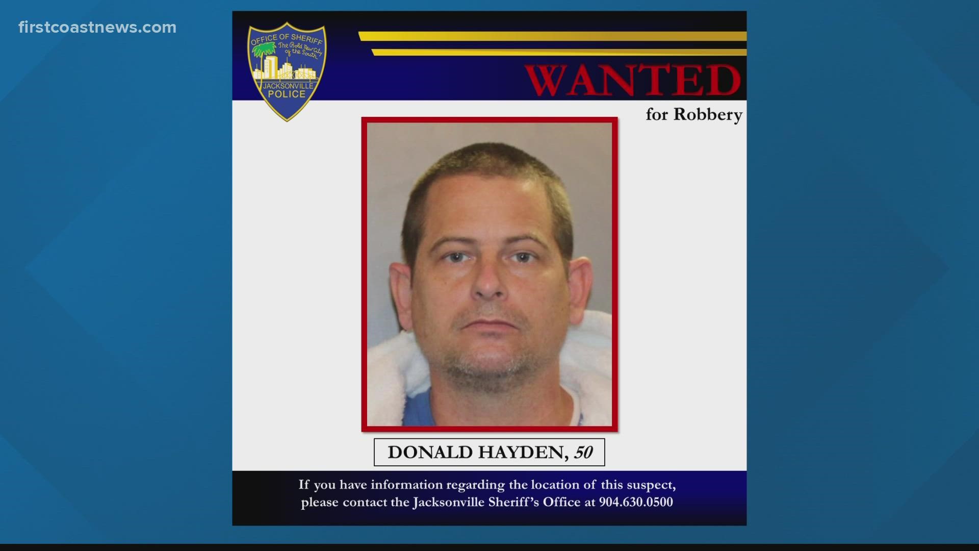 Police say Donald Wayne Hayden, 50, currently has a warrant out for his arrest.