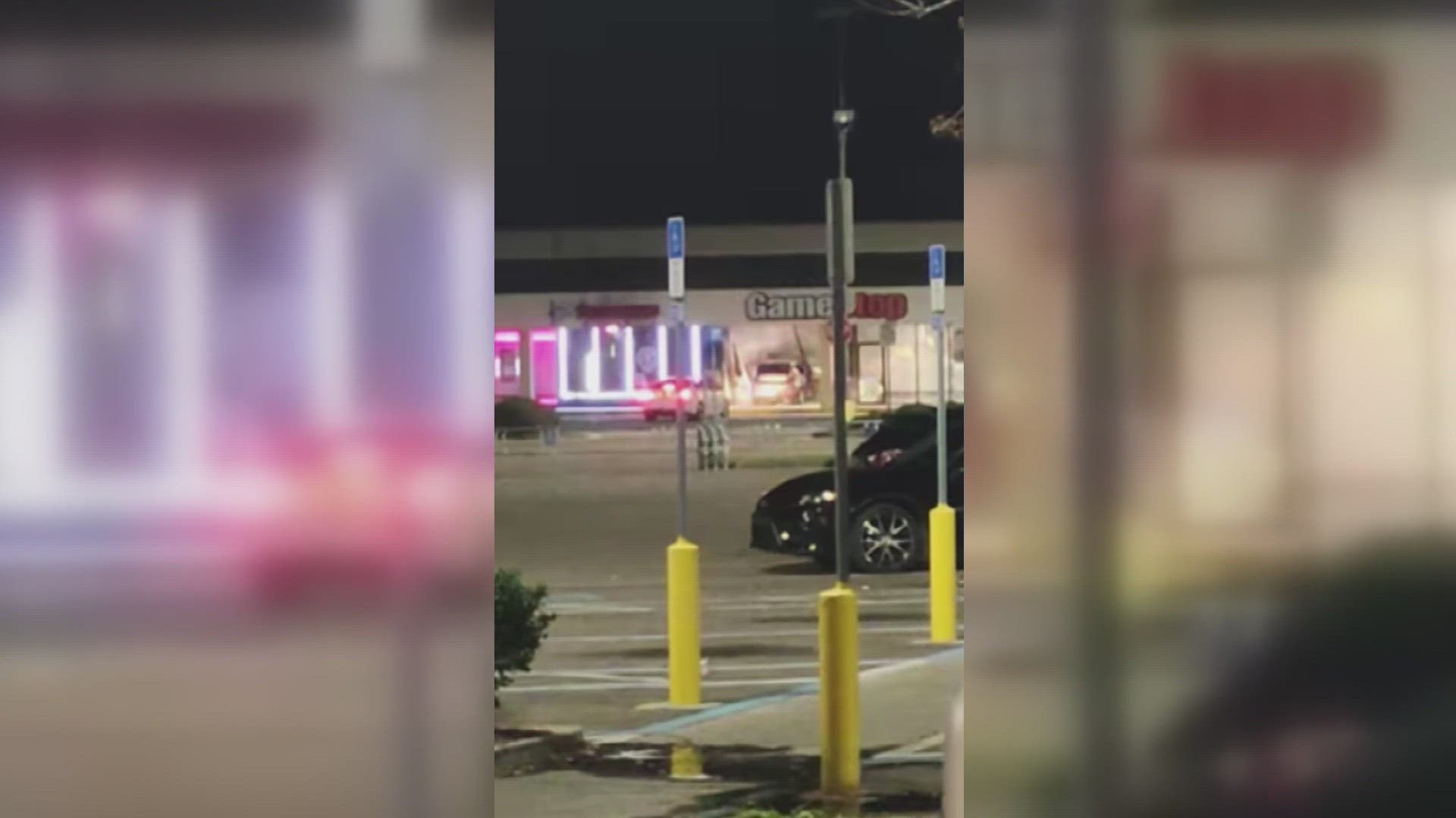 One video posted to social media showed a white car driving into the GameStop.