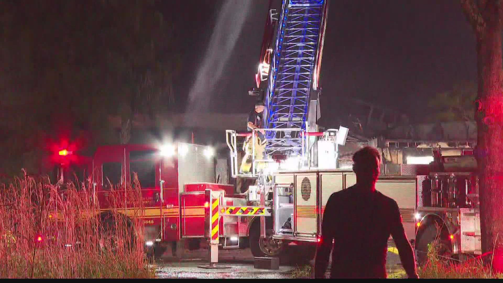 Crews responded to flames at Ellis Road and Mizzell Drive around 8:35 p.m. at an old radio station, according to officials.