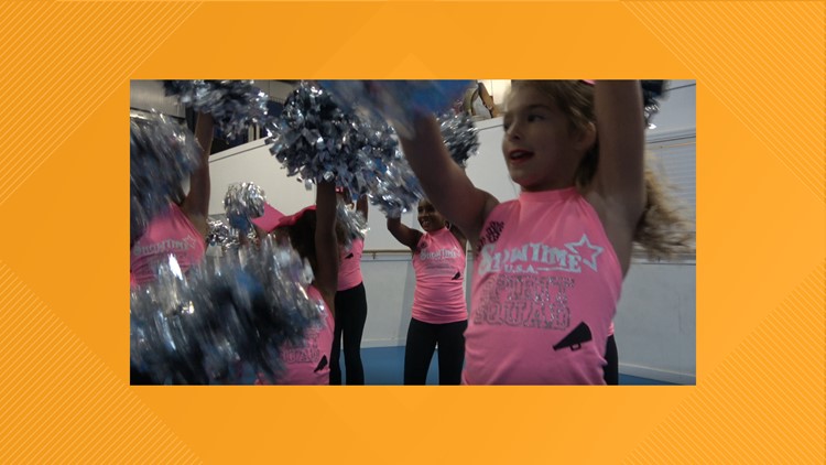 'Kicking cancer's booty!' - cheerleaders urge moms to get mammos on the Buddy Bus
