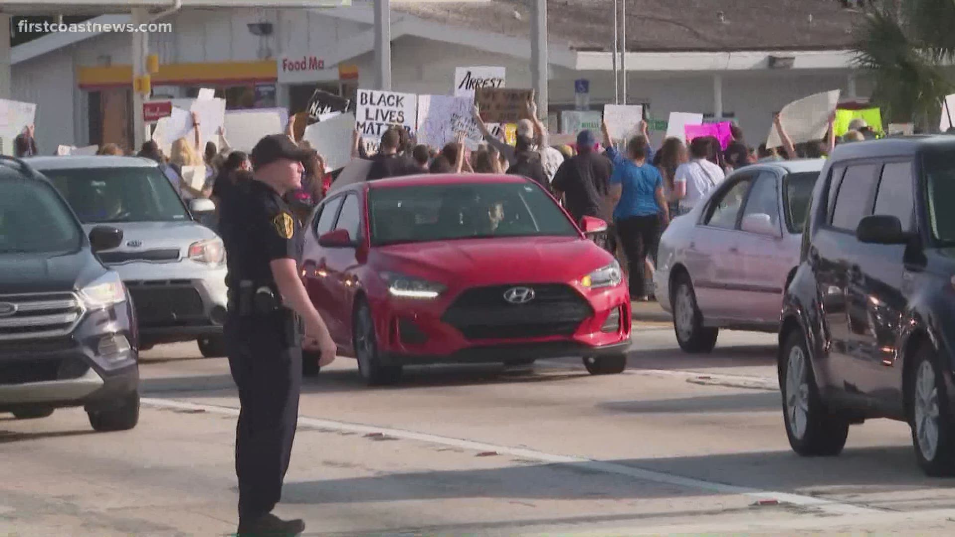 A group of about 200 protesters is walking along U.S. 1 in St. Augustine, demonstrating against police brutality.