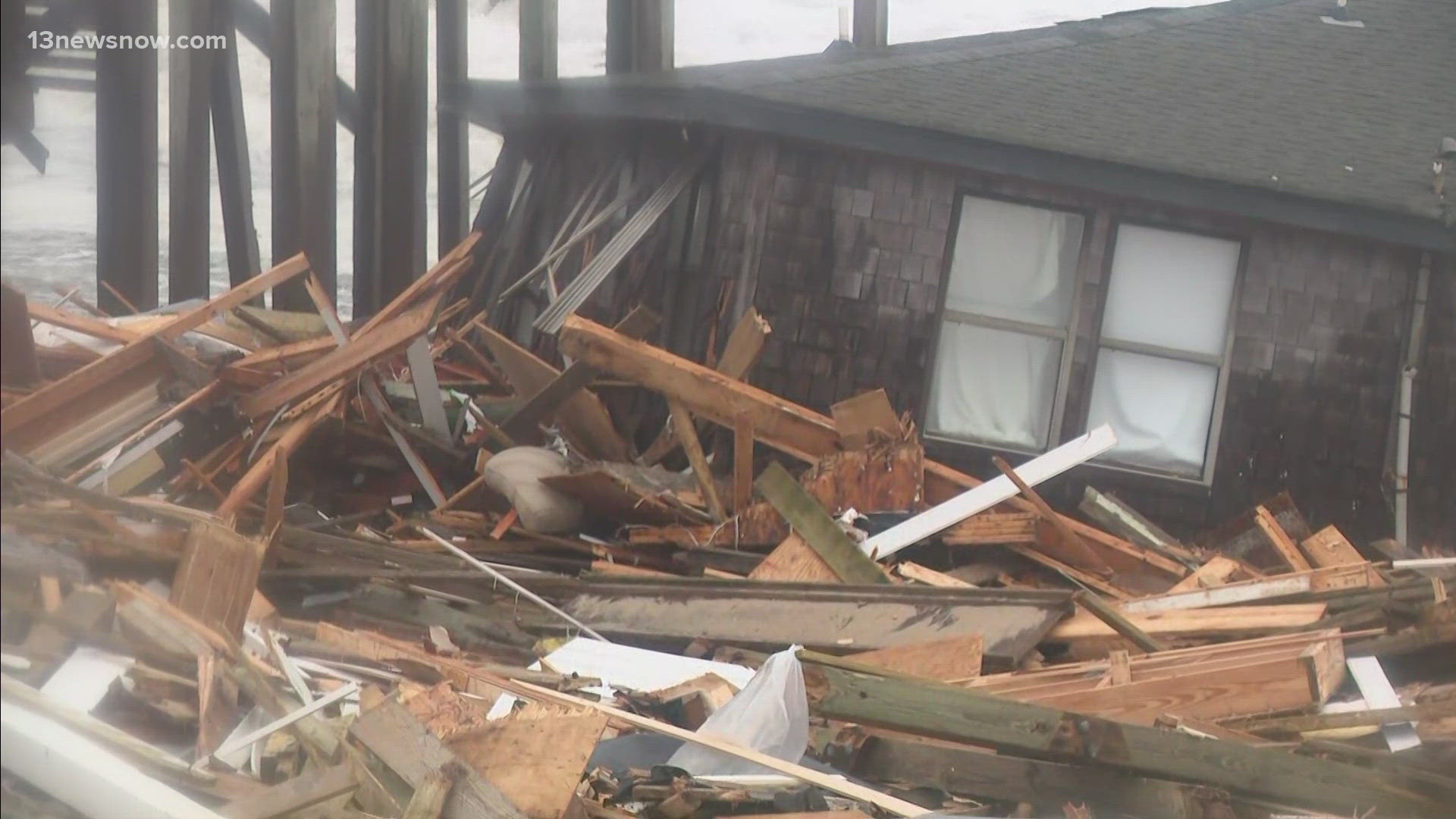 Five houses collapsed in Buxton on Tuesday afternoon as strong surf from Hurricane Humberto and Hurricane Imelda strikes the coast.