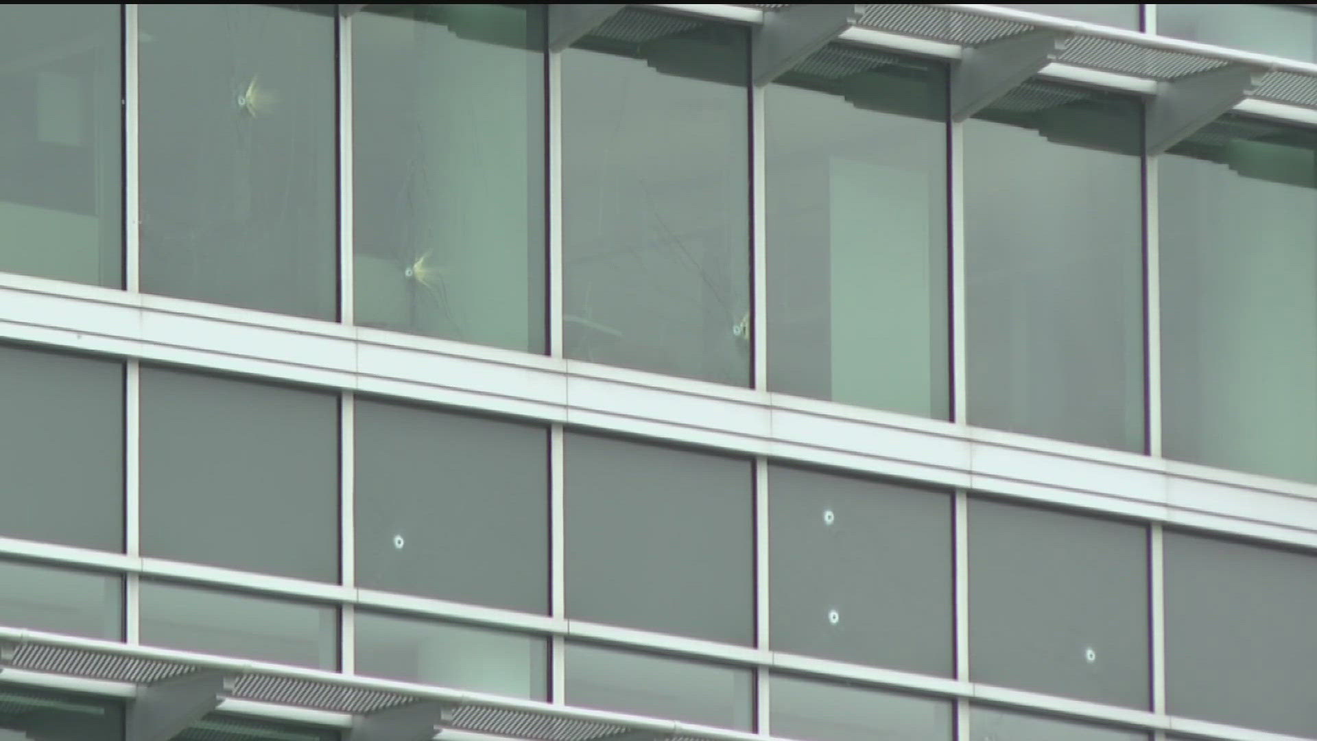 Bullet holes riddled windows at buildings of the CDC.