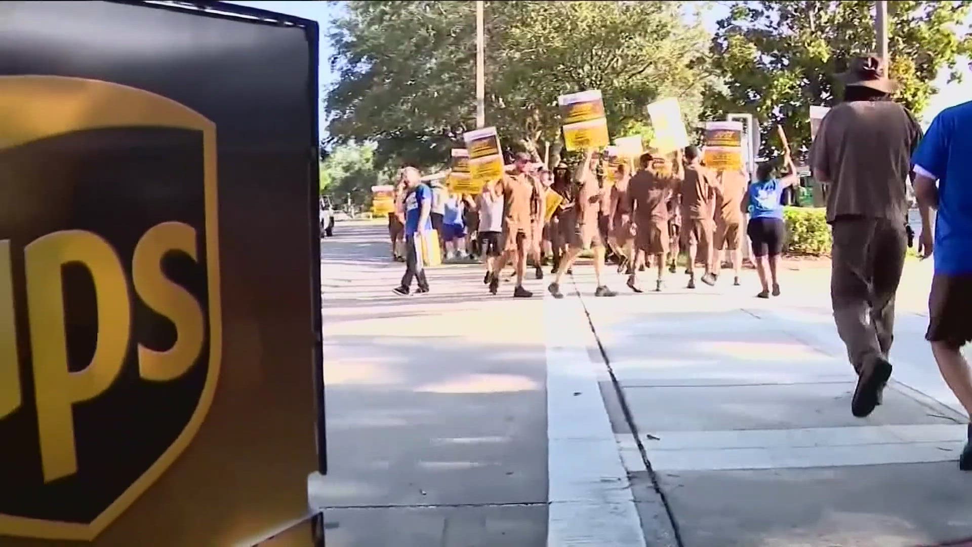 UPS reached a tentative contract with its 340,000-person union, potentially averting a strike.