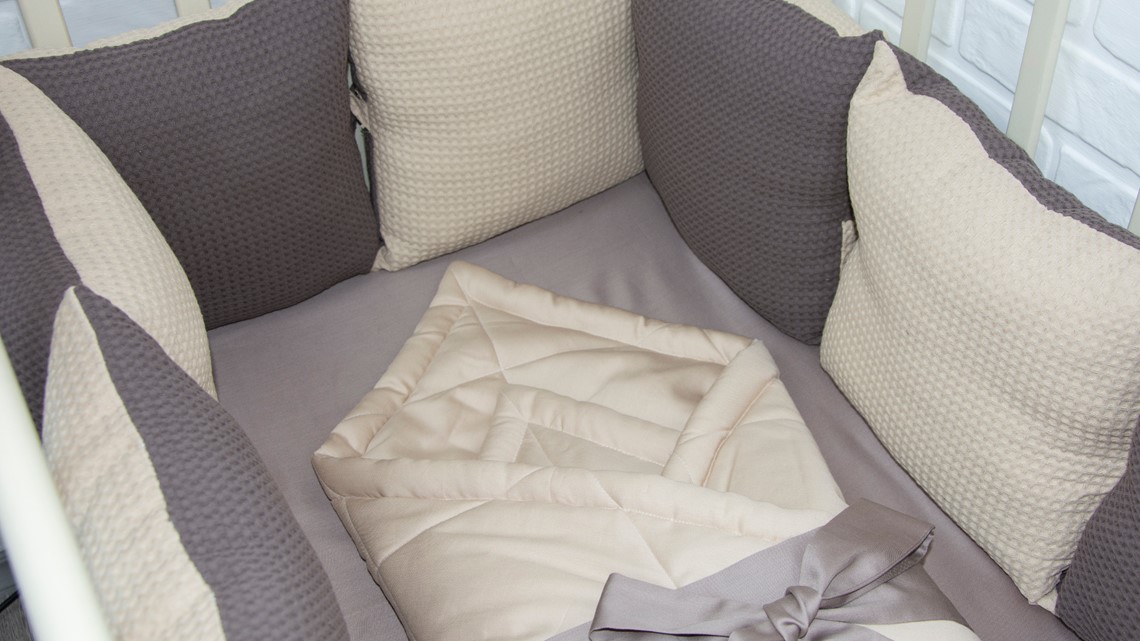 Crib bumpers banned Safe Cribs Act